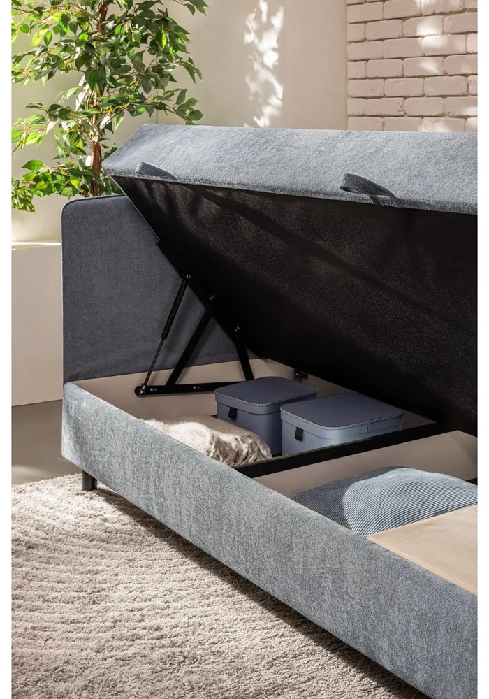 Modrá čalúnená jednolôžková posteľ s úložným priestorom s matracom 90x200 cm Avela – Bonami Selection