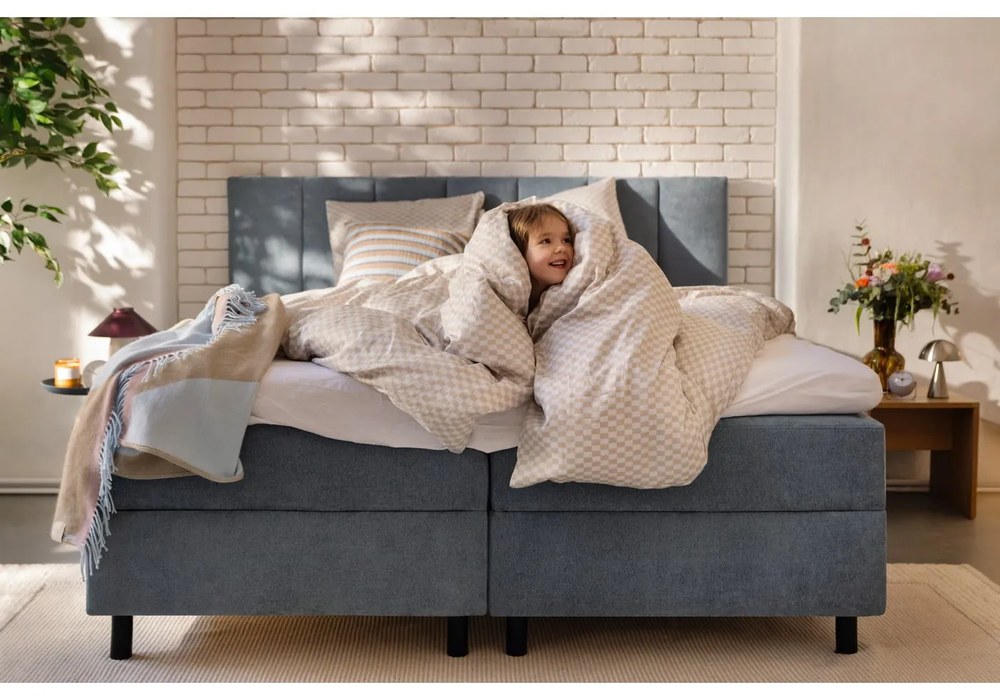 Modrá boxspring posteľ s úložným priestorom 180x200 cm Elva Bold Line – Bonami Selection