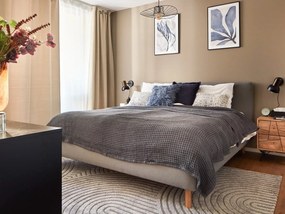 Sivá čalúnená dvojlôžková posteľ s úložným priestorom s roštom 180x200 cm Mattis – Meise Möbel