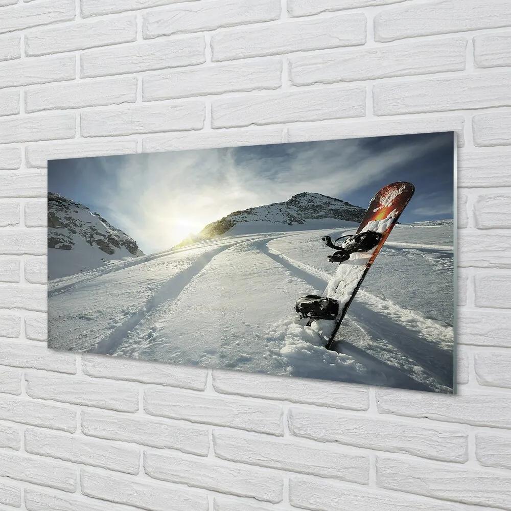 Obraz na skle Doska v snehu horách 100x50 cm