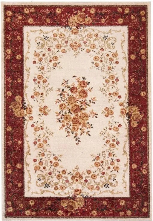 Rustikálny béžovo červený koberec s kvetmi