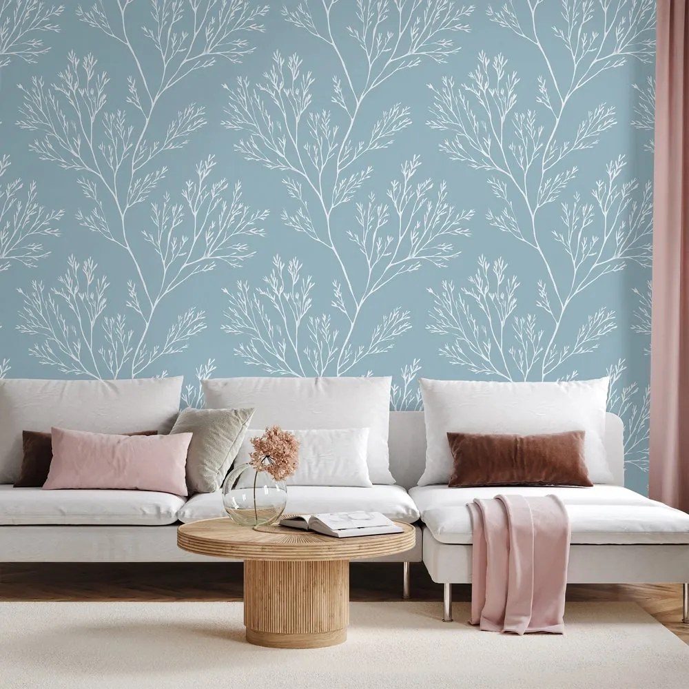 Fototapeta biele vetvičky na modrom pozadí