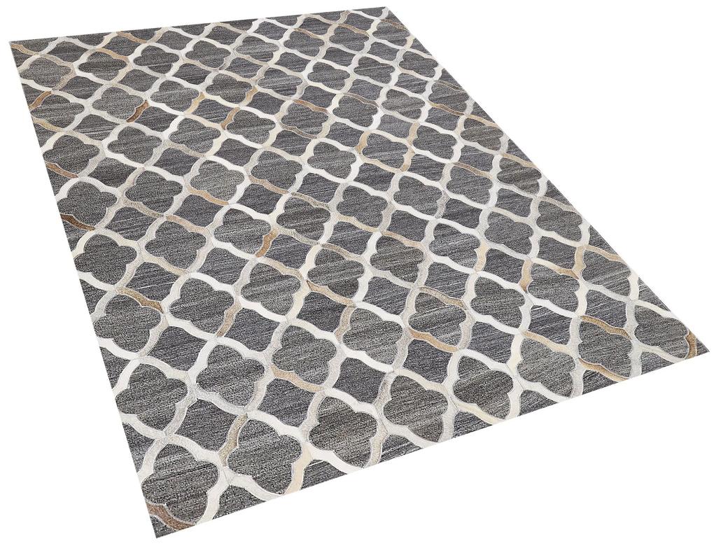 Kožený koberec 140 x 200 cm sivá/béžová ROLUNAY Beliani