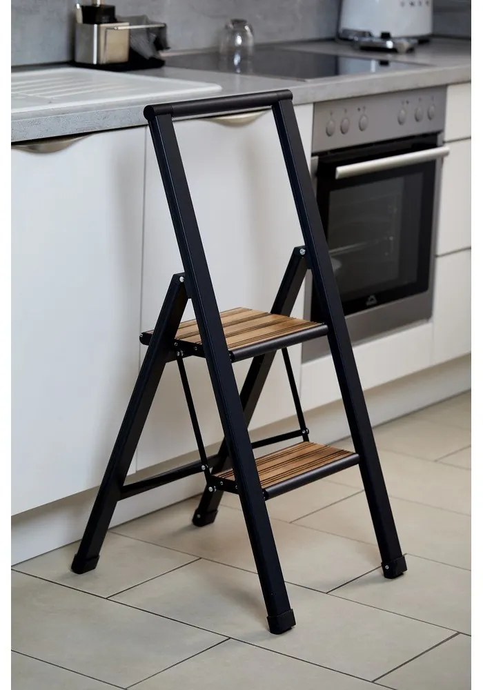 Čierny hliníkový protišmykový skladací rebrík Wenko Stepladder II.