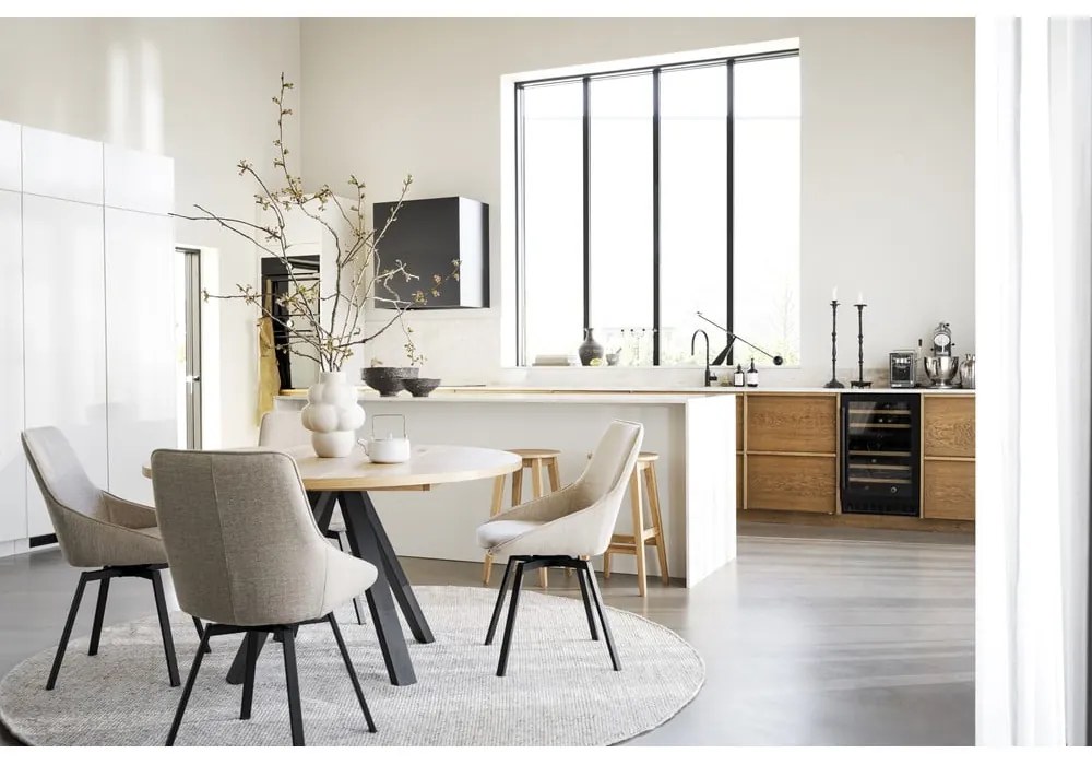 Okrúhly rozkladací jedálenský stôl v dekore duba v prírodnej farbe ø 135 cm Maddock – Rowico