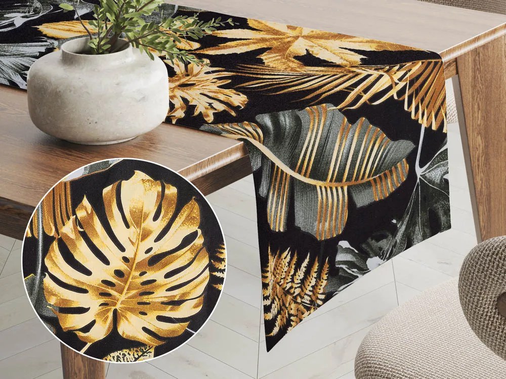 Biante Bavlnený behúň na stôl Sandra SA-389 Sivozelené a zlaté tropické listy na čiernom 20x140 cm