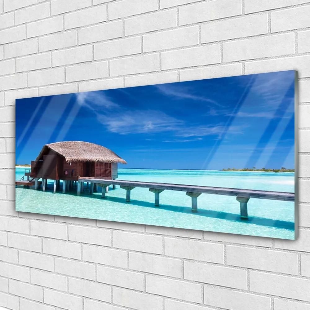 Obraz na akrylátovom skle More pláž dom architektúra 125x50 cm