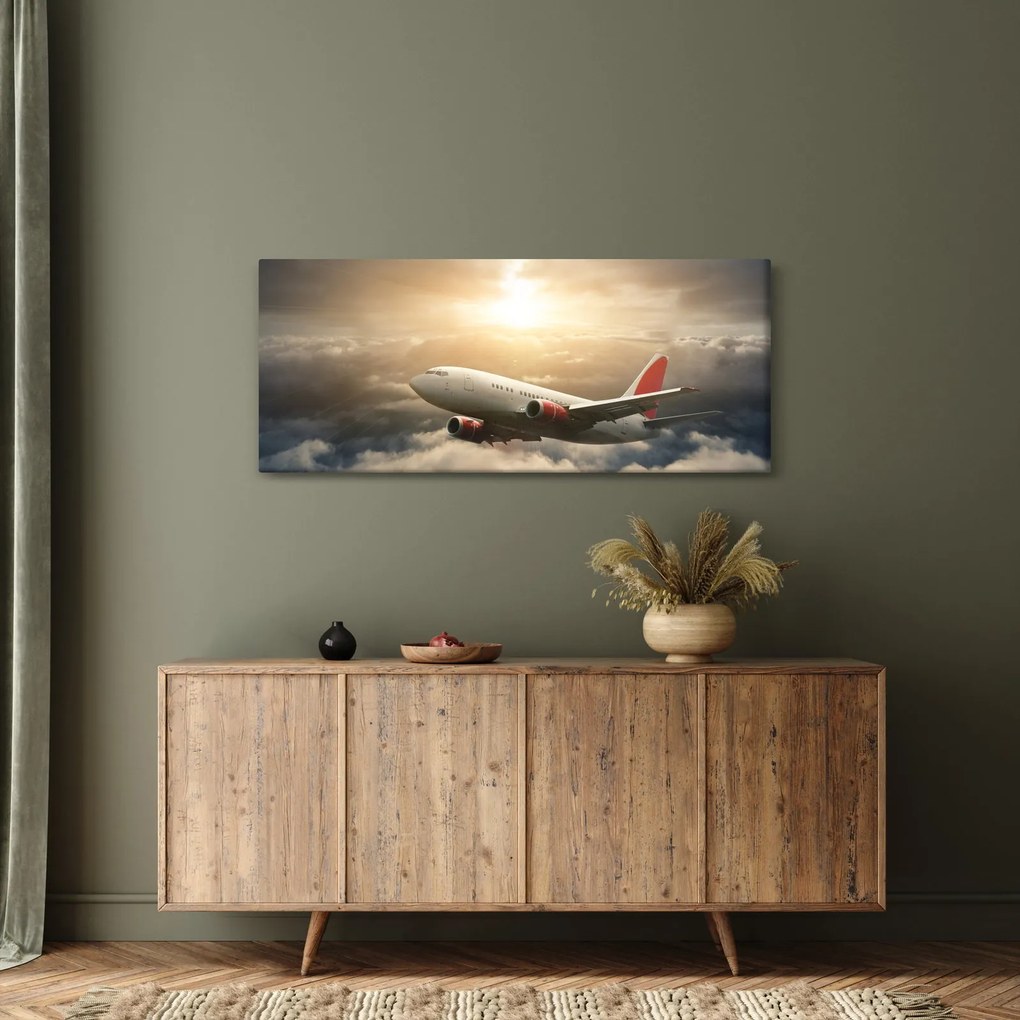 Obraz - Lietadlo v oblakoch (120x50 cm)