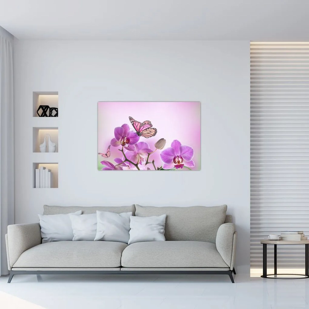 Obraz - Motýľ na kvetoch orchidey, lila (90x60 cm)