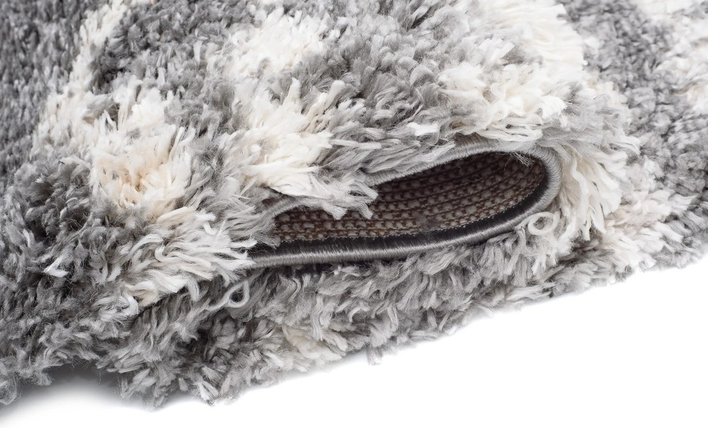 TA Koberec FN28A TMAVOSIVÁ AZTÉCKA EJF Rozmer: 70x300 cm