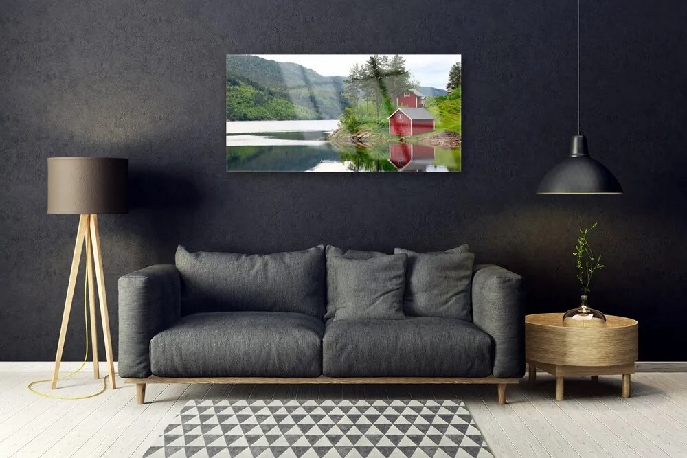 Obraz na skle Hory dom jazero príroda 140x70 cm