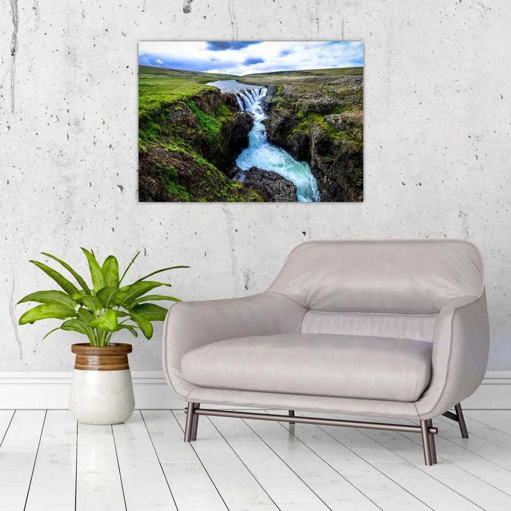 Sklenený obraz vodopádu medzi skalami (70x50 cm)