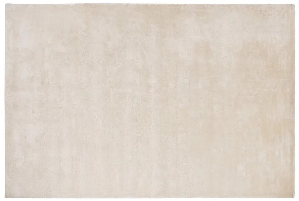 Viskózový koberec 140 x 200 cm svetlobéžový GESI II Beliani