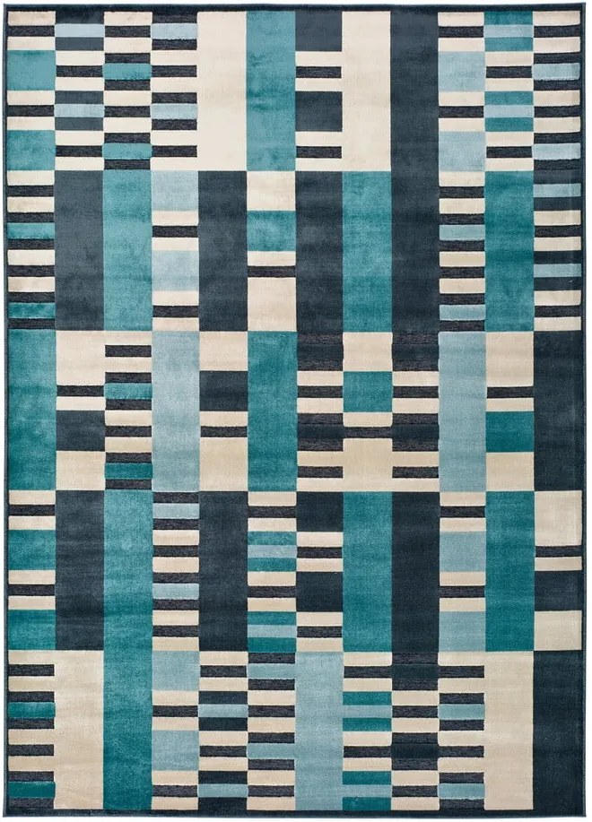 Modrý koberec Universal Farashe Stripes, 120 x 170 cm