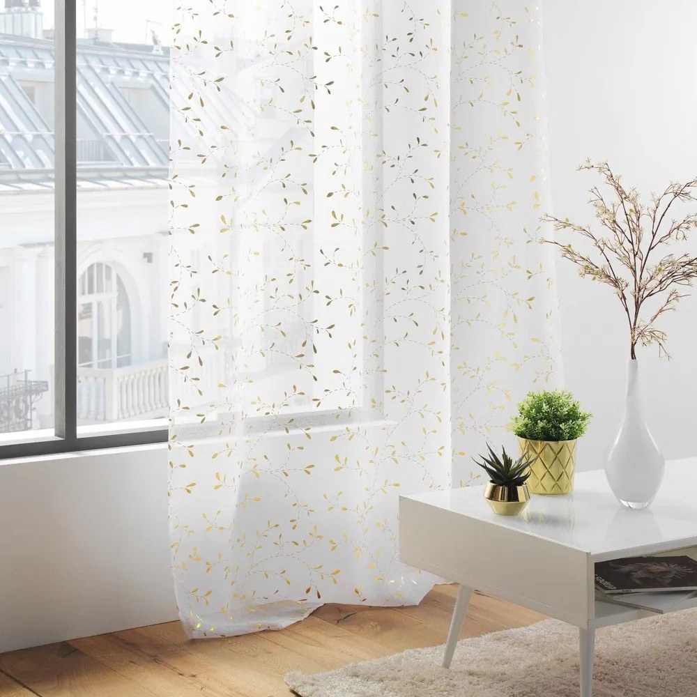 Voálová záclona v bielo-zlatej farbe 140x240 cm Floressia – douceur d'intérieur