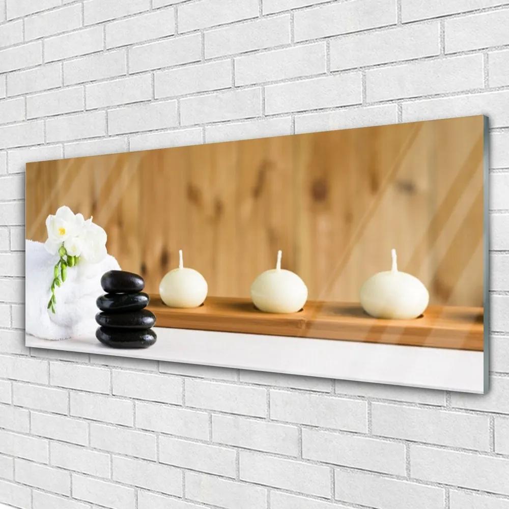 Obraz plexi Sviece kamene zen kúpele 125x50 cm