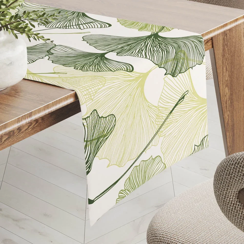 Biante Bavlnený behúň na stôl Sandra SA-576 Zelené Ginkgo listy na bielom 45x140 cm