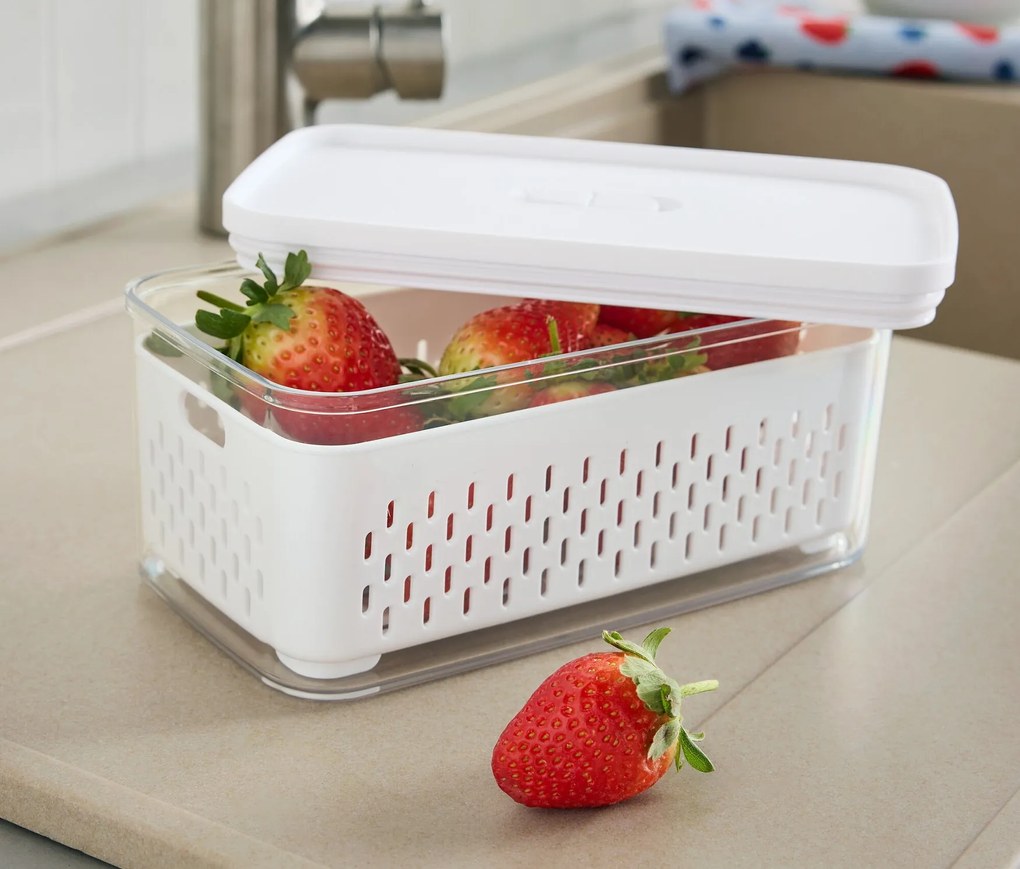 Dóza na potraviny so zabudovaným sitkom