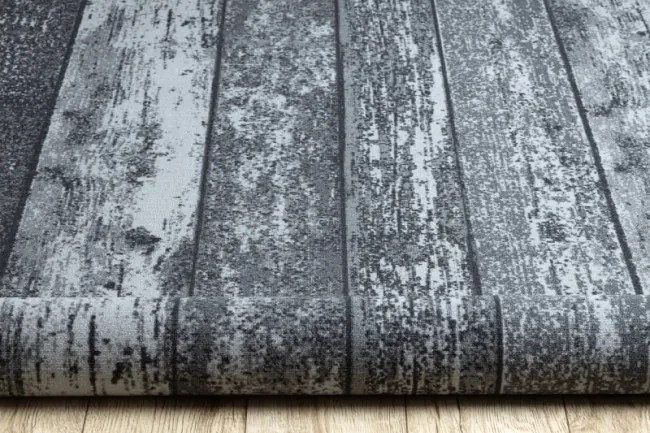 Protišmykový metrážny koberec WOOD drevo, dosky - sivý
