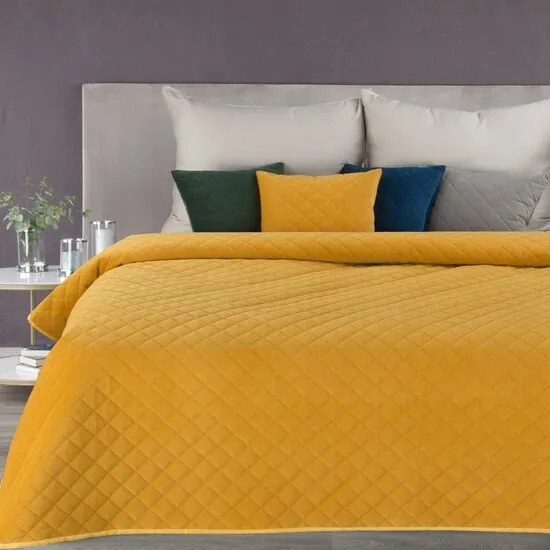 Žltý prehoz na posteľ s geometrickým vzorom