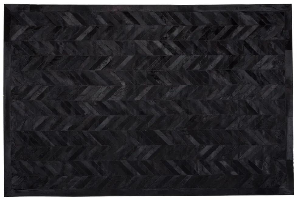 Kožený koberec 140 x 200 cm čierny BELEVI Beliani