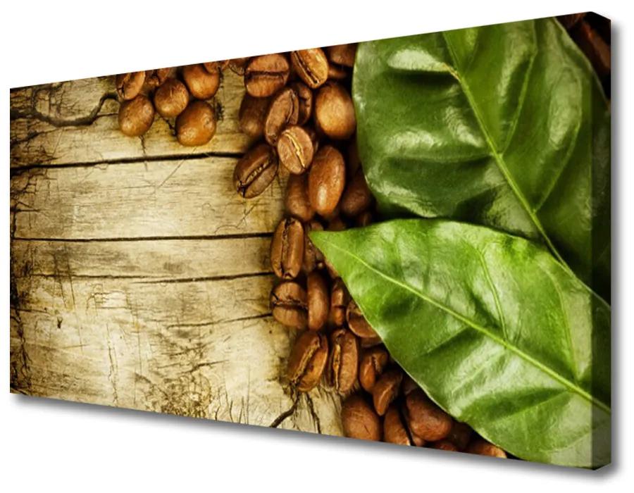 Obraz na plátne Zrnká káva listy kuchyňa 140x70 cm
