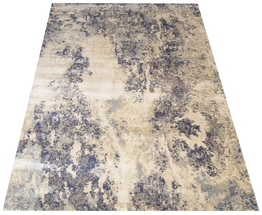 Melírovaný dizajnový koberec s béžovým podkladom