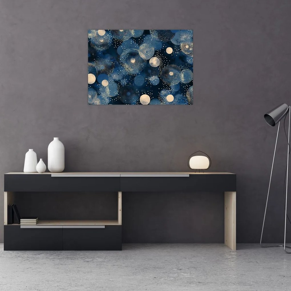 Sklenený obraz - Modro-zlaté krúžky (70x50 cm)