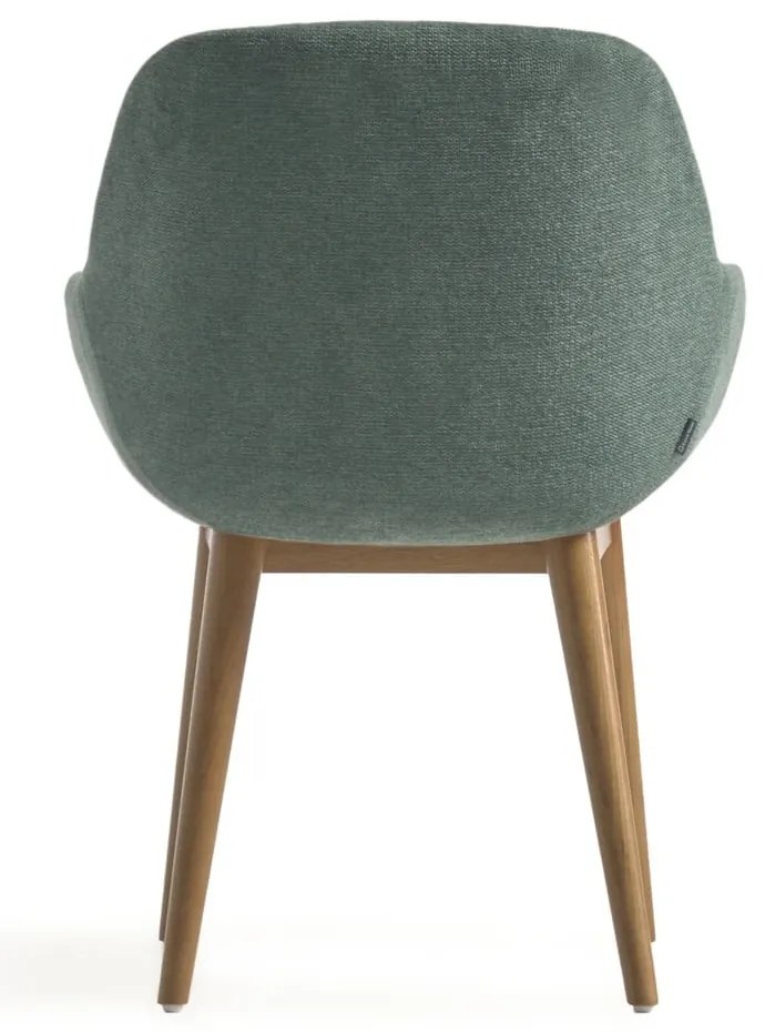 Zelené čalúnené jedálenské kreslo s podrúčkami Konna – Kave Home