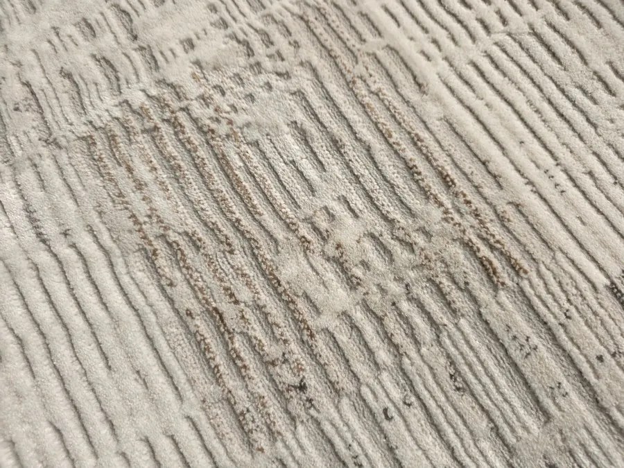 DC Koberec Oman 637 tmavá vizion zlatá Rozmer: 140×190 cm