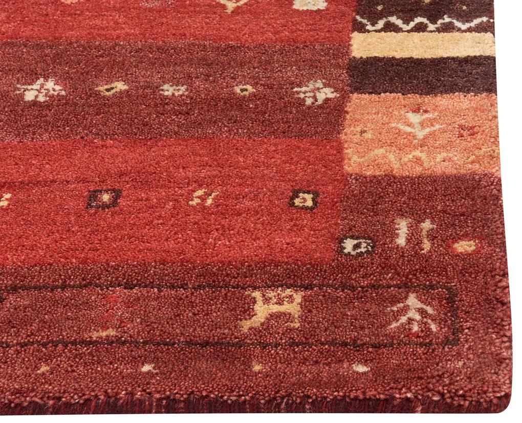 Vlnený koberec gabbeh 80 x 150 cm červený SINANLI Beliani