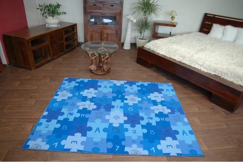 Detský metrážny koberec PUZZLE modrý - 100 cm