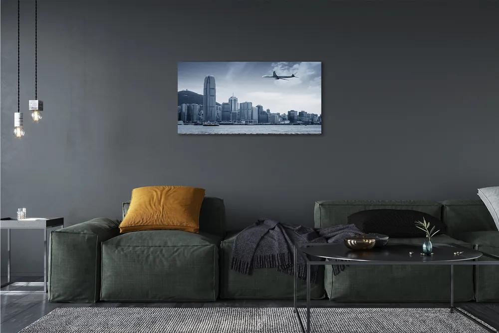 Obraz canvas Lietadiel mraky město 120x60 cm