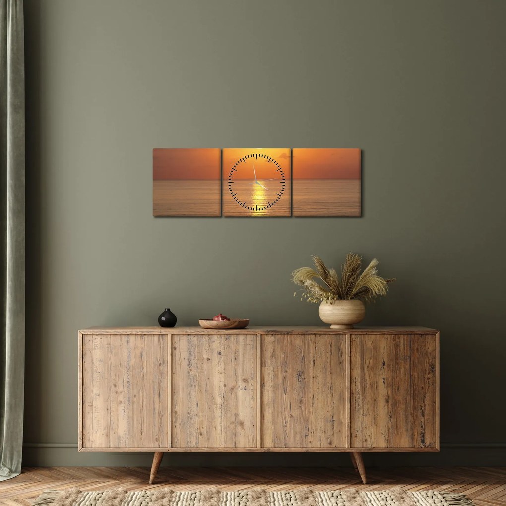 Obraz - Západ slnka nad oceánom (s hodinami) (90x30 cm)