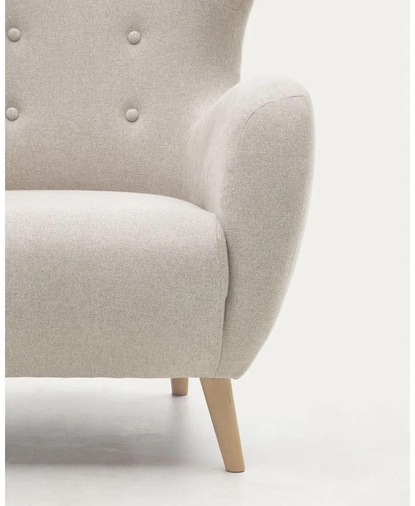 Béžové kreslo ušiak Patio – Kave Home