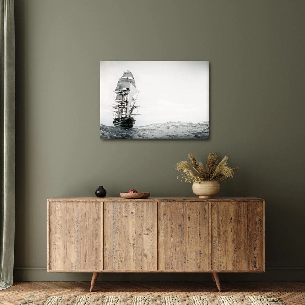 Obraz - Loď plávajúca po oceáne (70x50 cm)