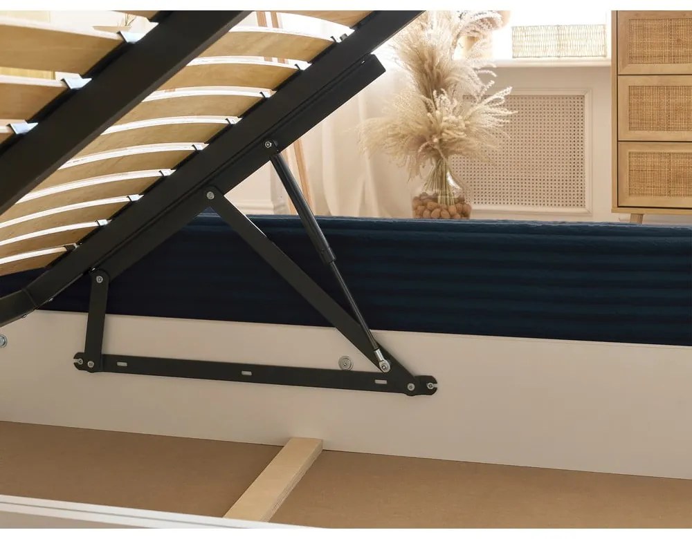 Tmavomodrá čalúnená dvojlôžková posteľ s úložným priestorom a roštom 180x200 cm Jade – Bobochic Paris