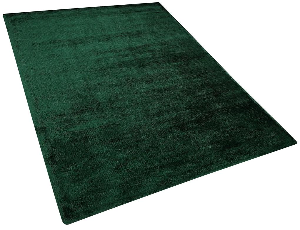 Viskózový koberec 140 x 200 cm tmavozelený GESI II Beliani