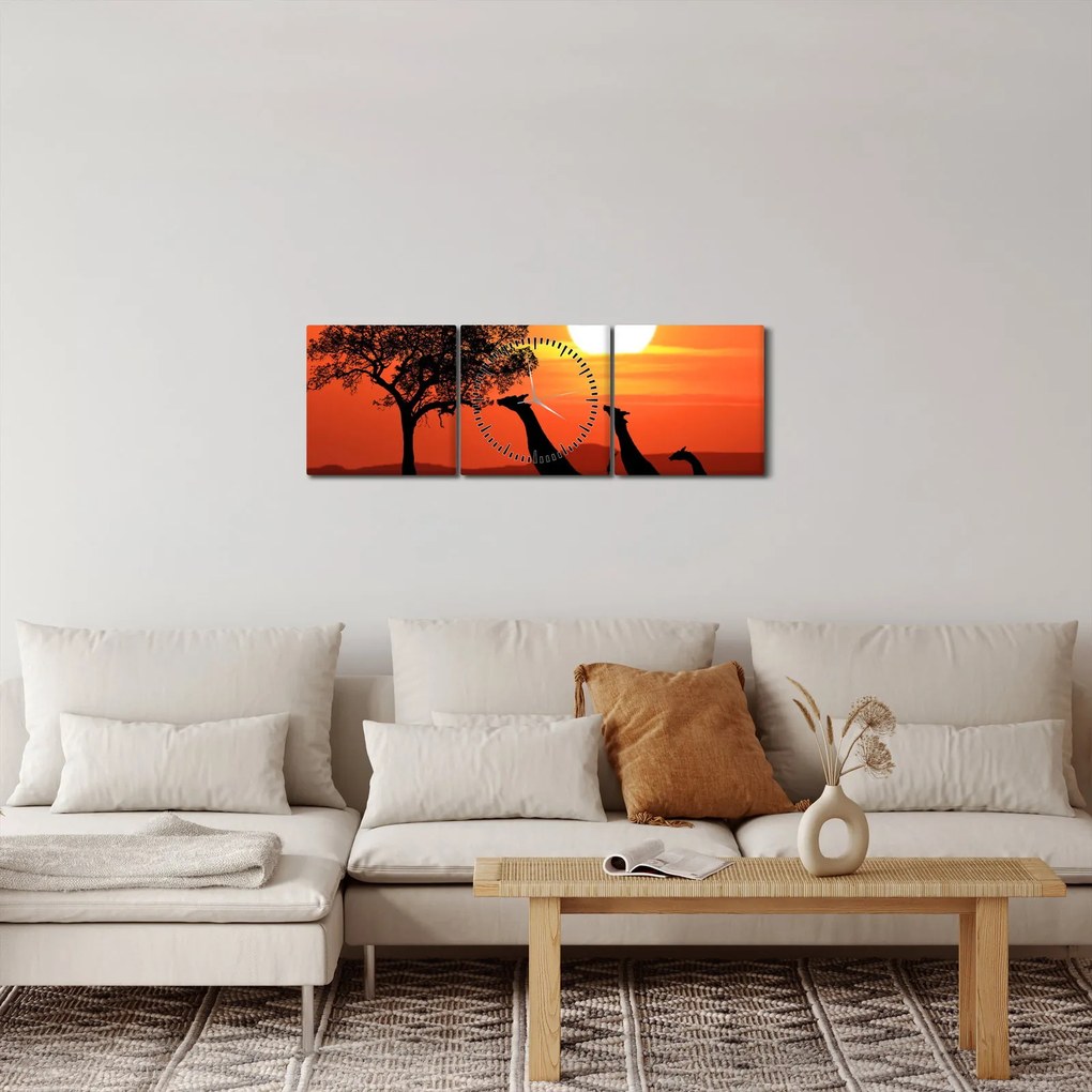 Obraz žirafy pri západe slnka (s hodinami) (90x30 cm)