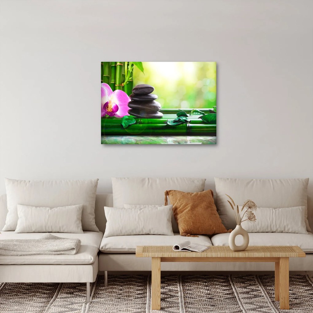 Obraz masážnych kameňov a orchidey na vode (70x50 cm)