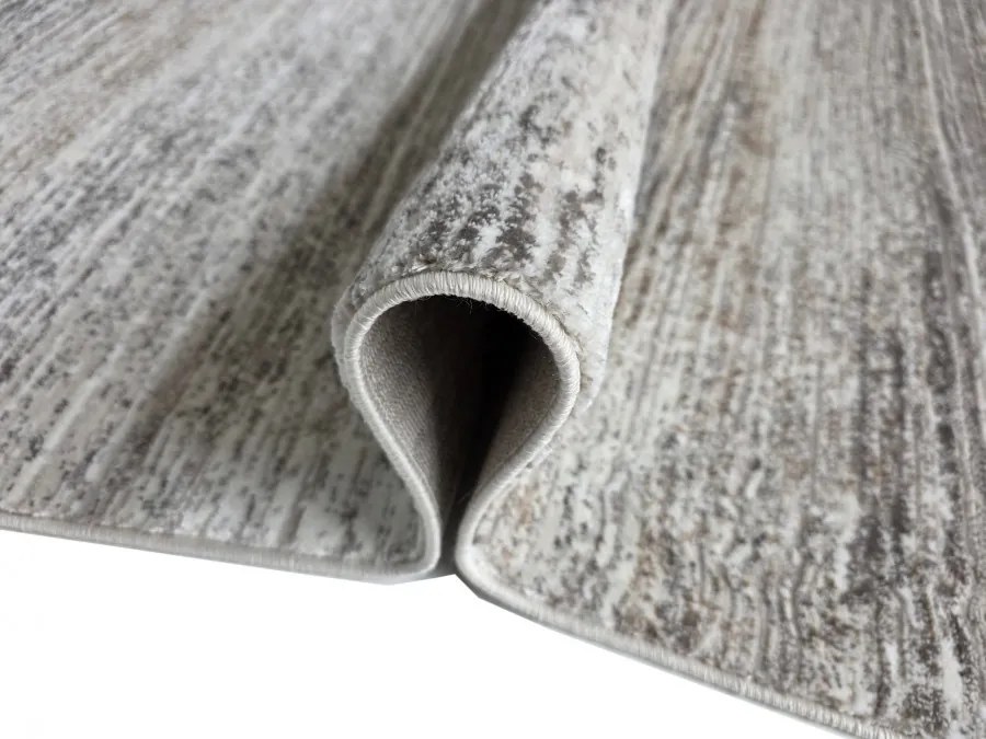 DC Koberec Oman 412 tmavá vizion zlatá Rozmer: 140×190 cm