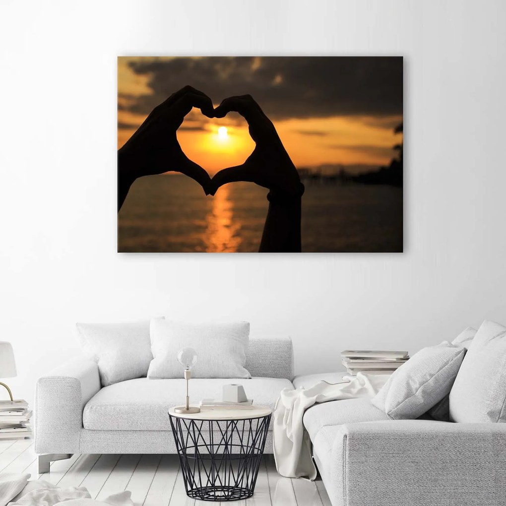 Gario Obraz na plátne Srdce s rukami a západ slnka Rozmery: 90 x 60 cm