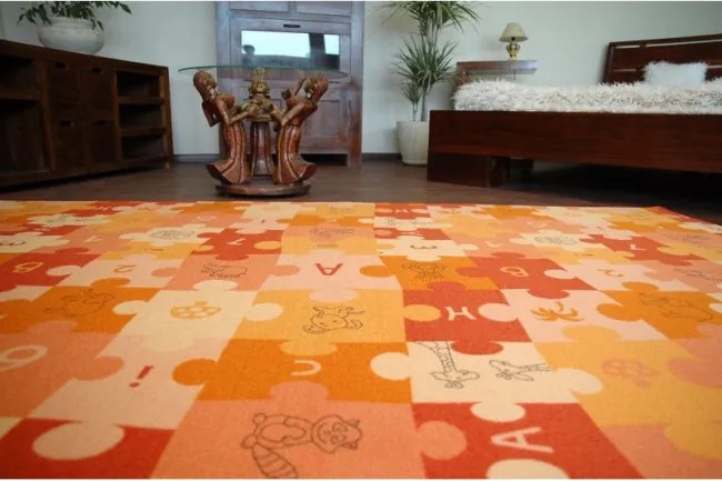 Detský koberec PUZZLE oranžový - Výpredaj