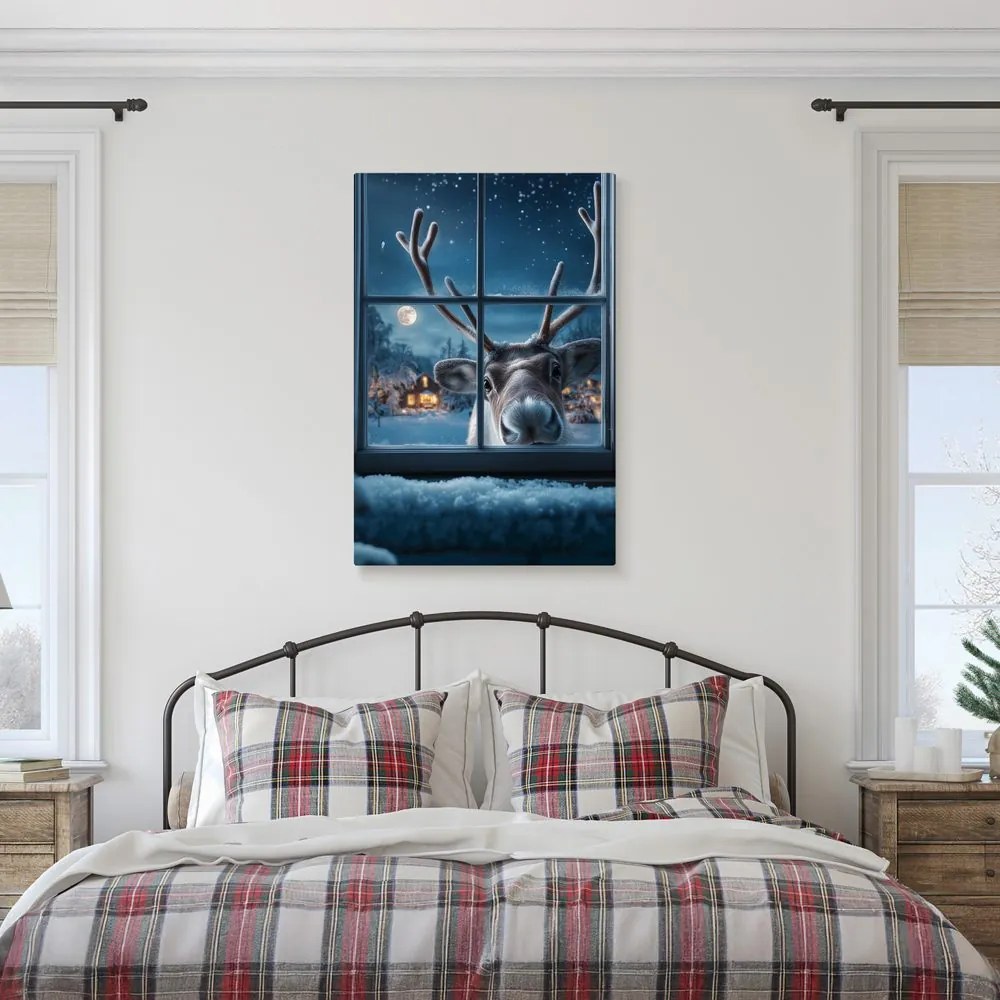 Vianočný obraz roztomilý sob za zasneženým oknom