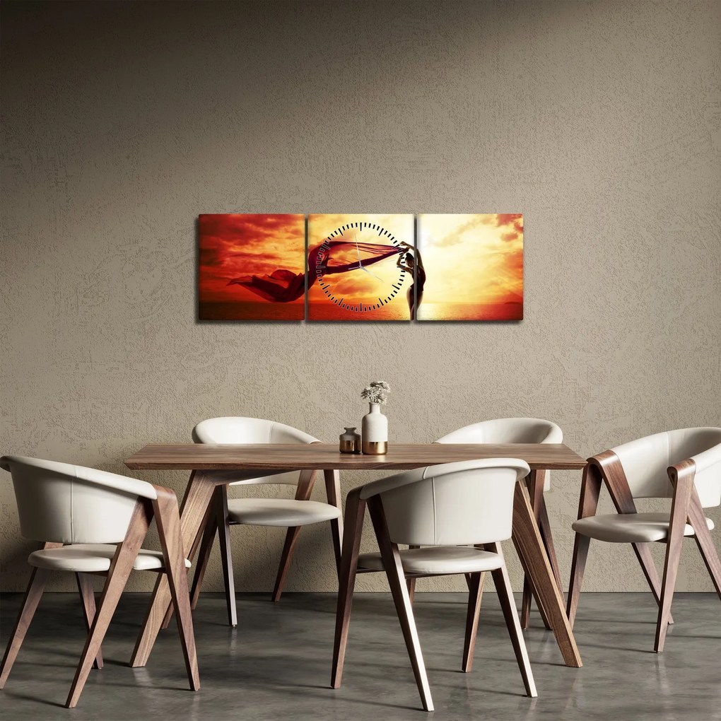 Obraz - Silueta ženy v západu slnka (s hodinami) (90x30 cm)