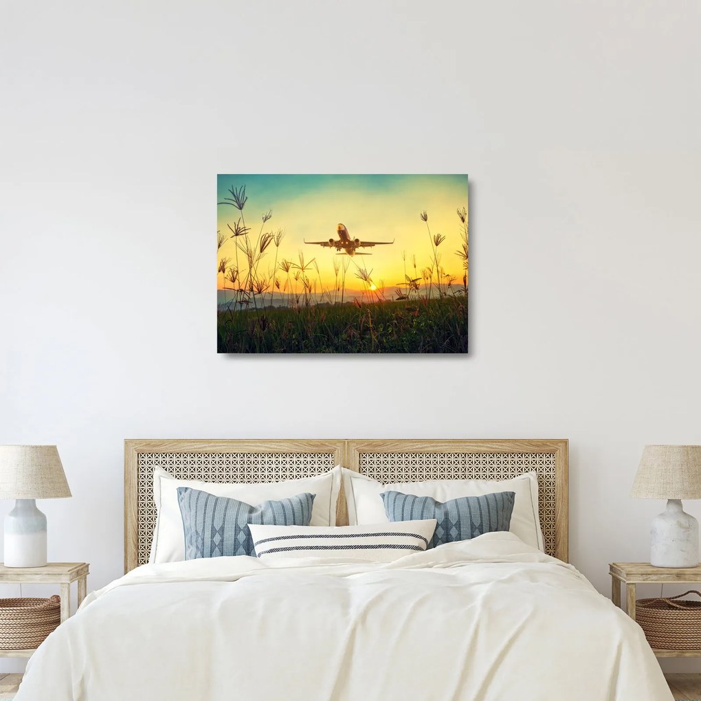 Sklenený obraz vzlietajúceho lietadla (70x50 cm)