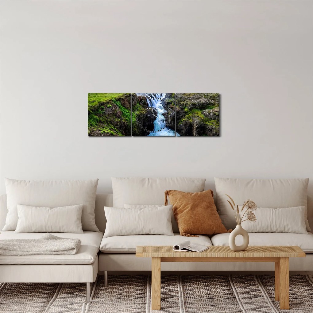 Obraz vodopádu medzi skalami (s hodinami) (90x30 cm)