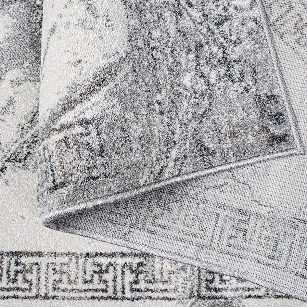 Sivý koberec so vzorom mandaly