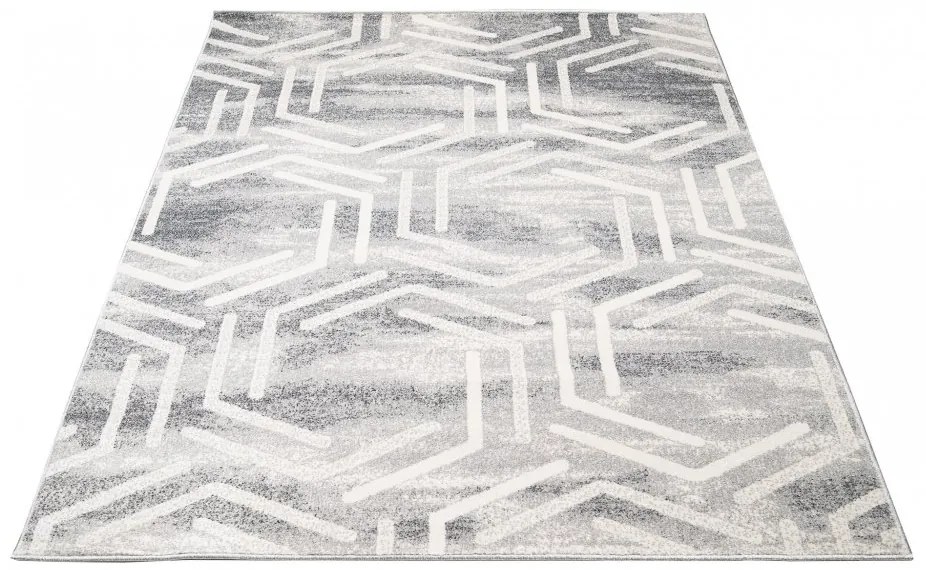 Svetlý dizajnový koberec s geometrickým vzorom Šírka: 80 cm | Dĺžka: 150 cm