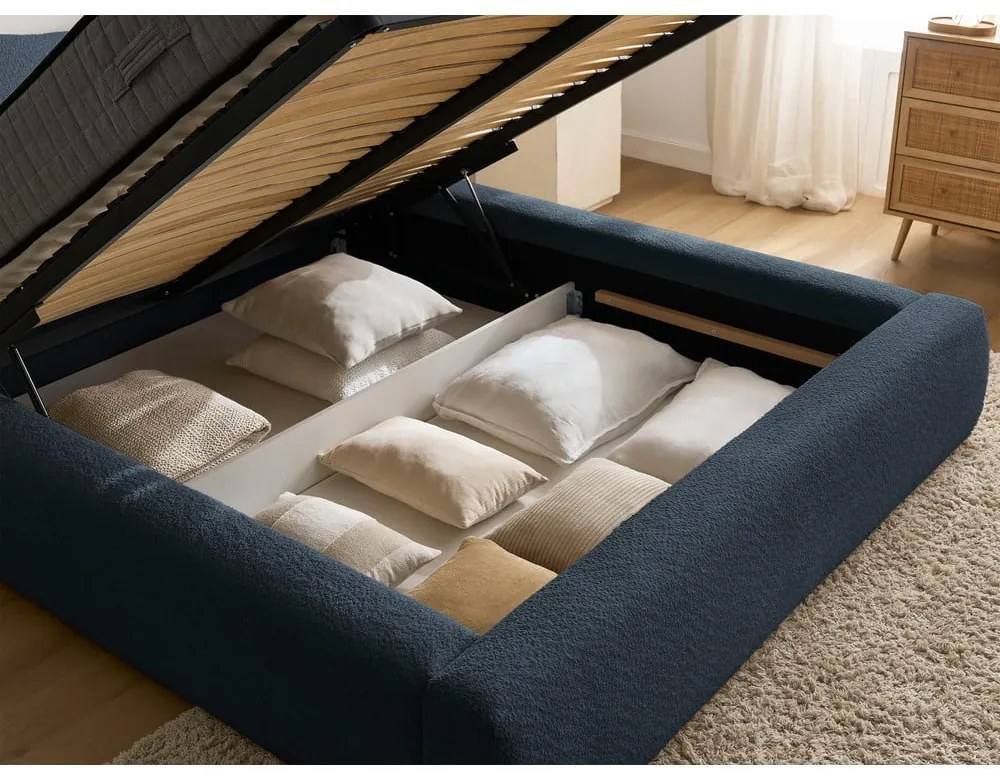 Tmavomodrá čalúnená dvojlôžková posteľ s úložným priestorom s roštom 160x200 cm Orlane – Bobochic Paris